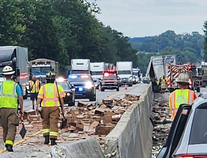 Hot dogs spill across interstate after tractor trailer crash to clog commute for steamed motorists