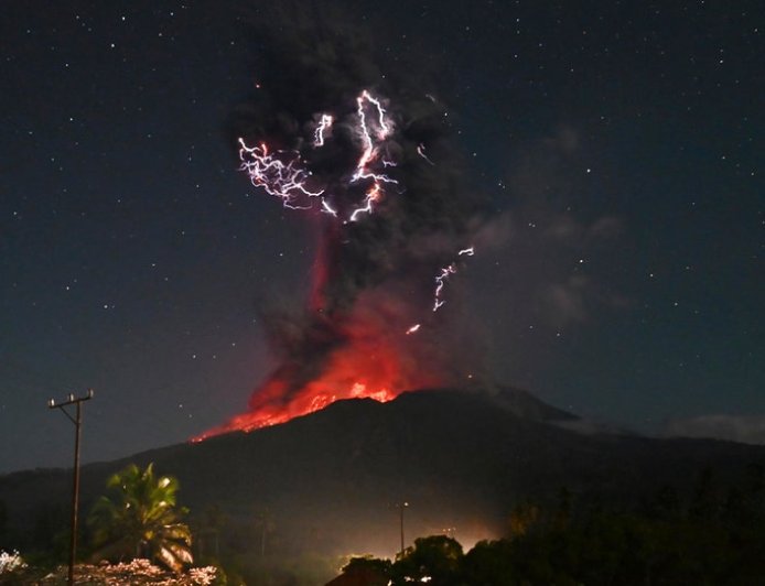 Stunning photos capture moment one of Indonesia's most active volcanoes erupts