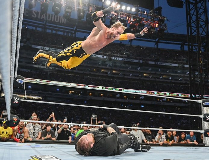 Logan Paul provides highlight reel moment with frog splash onto Jelly Roll through table at SummerSlam
