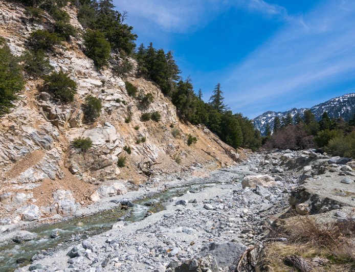 Cries for help lead rescuers to injured hiker after terrifying 25-foot plunge at popular waterfall