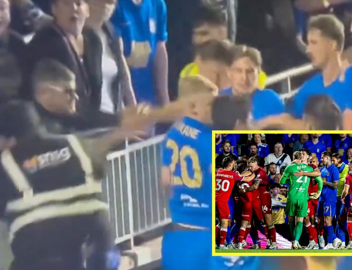 Championship opener descends into chaos as fan tries to punch player in shocking scenes