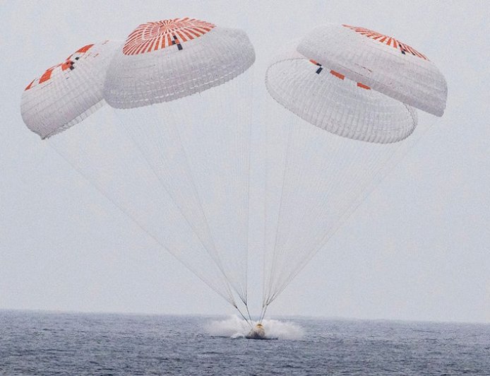 Astronauts splash down in Pacific after completing ISS mission that relieved stranded crew members