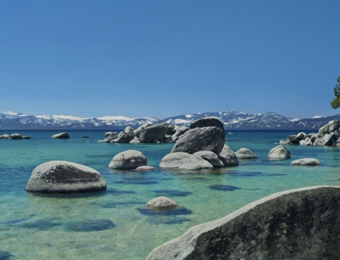 苹果 macOS Tahoe 悄悄引入 15 款全新航拍风景屏保，收录太浩湖 / 喜马拉雅山等地自然景观