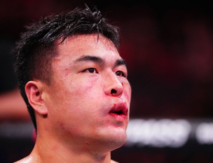 Michael Bisping stunned as UFC Shanghai main event ends in shocking fashion and crowd is silenced