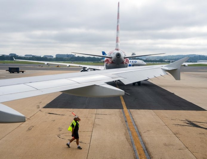 Smoke from unknown passenger device forces emergency landing of American Airlines flight to Washington-Dulles