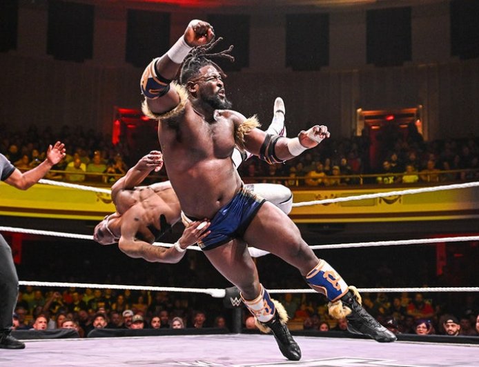 WWE star Oba Femi throws opponent through table from ring during Heatwave match, retains title