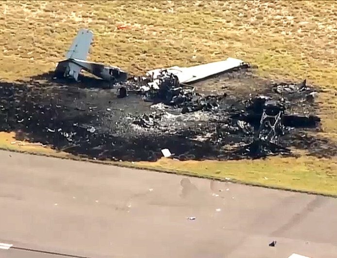 Midair plane crash kills one person near Colorado airport as both planes catch fire