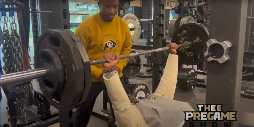 Deion Sanders casually benched 245 pounds in winter coat and chains without warming up after medical scare