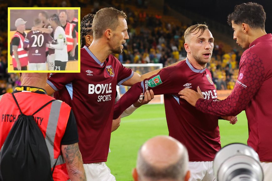 Jarrod Bowen apologises as he’s held back by teammates after argument with West Ham fans