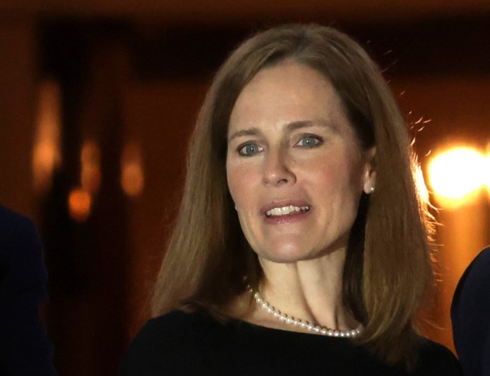 Barrett says justices 'wear black, not red or blue' in response to partisan critics in Fox News interview