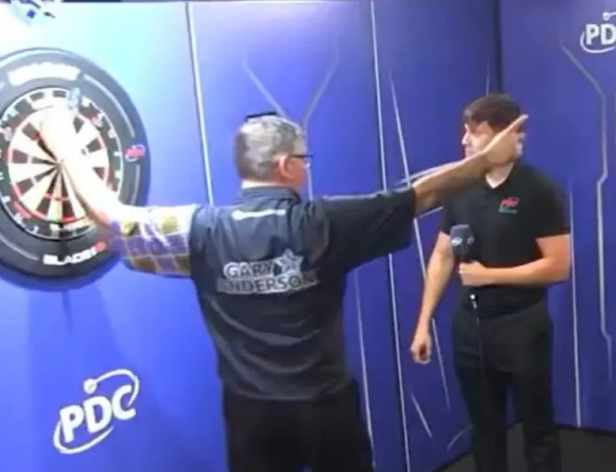 Darts star risks fine with incredible act of sportsmanship to rival