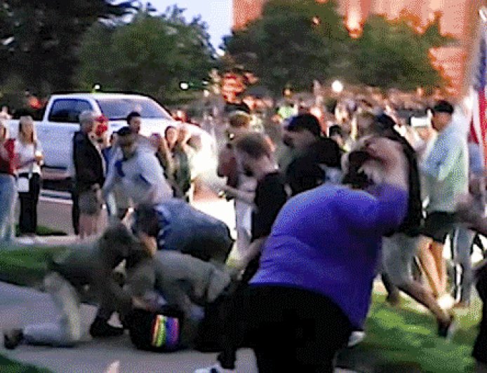 Video captures fight erupting at Charlie Kirk vigil after activist reportedly shouts profanity at crowd