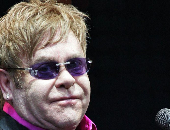 How Elton John Turned Health Woes Into A Powerful Fashion Moment With 'Timeless Pieces That Will Last for Centuries'