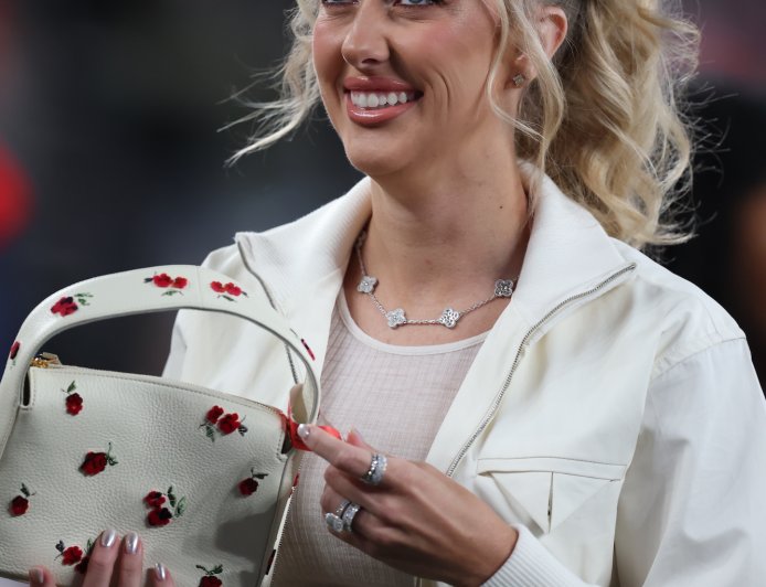 Brittany Mahomes Poses With Pat Mahomes Sr In All-White Outfit at SNF Game
