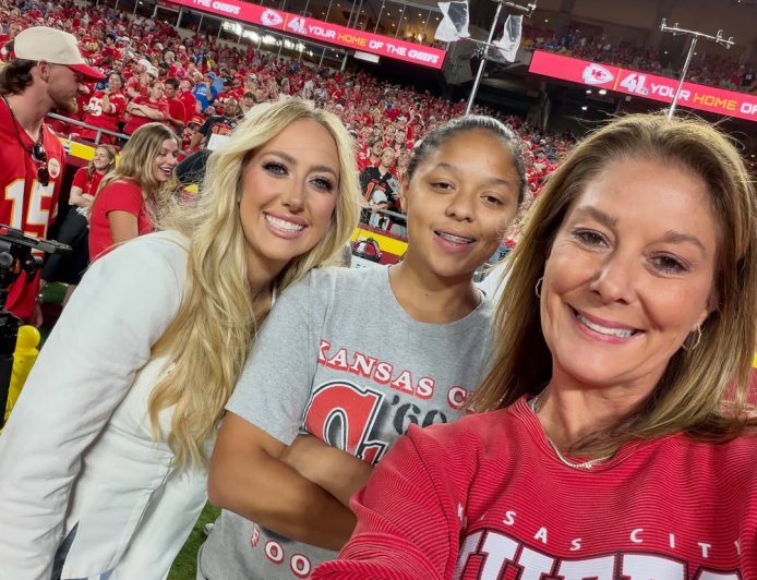 Brittany Mahomes Rocks White Shirt and Denim While Kissing Patrick Mahomes