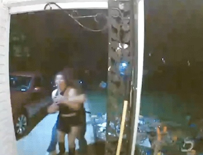 Police release major update after viral video shows screaming woman being pulled from doorway