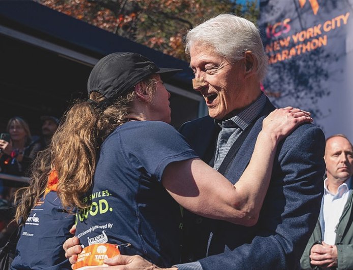Bill Clinton spotted at NYC Marathon with bandaged nose while cheering on daughter Chelsea