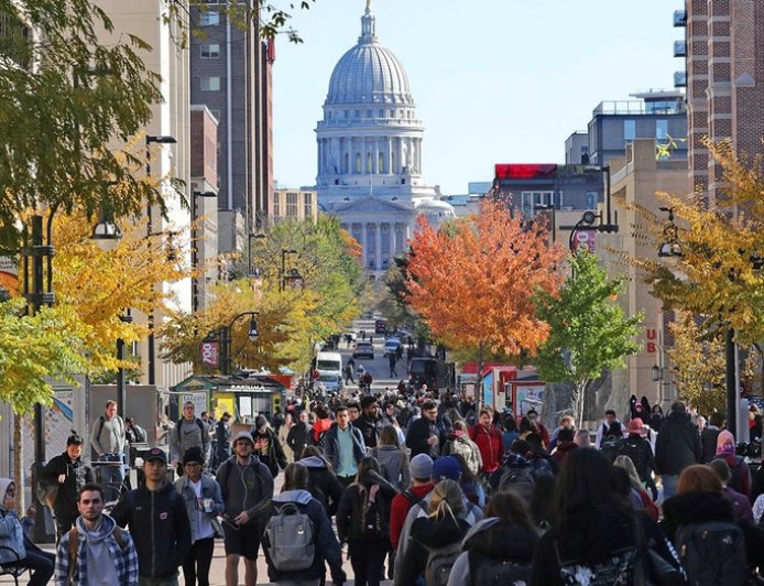 Graphic anti-ICE imagery at University of Wisconsin shows agent with bullet in head: 'Speak their language'