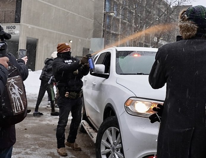 Minneapolis police chief blasts ICE after agent seen dragging woman through street, kneeling on her back