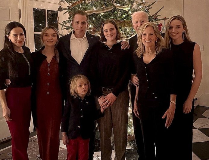 Biden nearly invisible in own Christmas family photo as Hunter takes center stage
