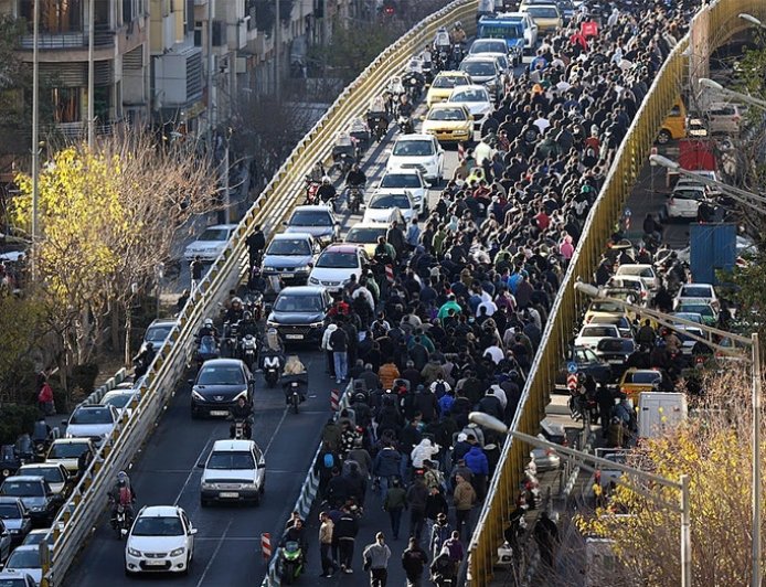 Iranian protesters clash with security forces as tear gas fills Tehran streets amid nationwide unrest