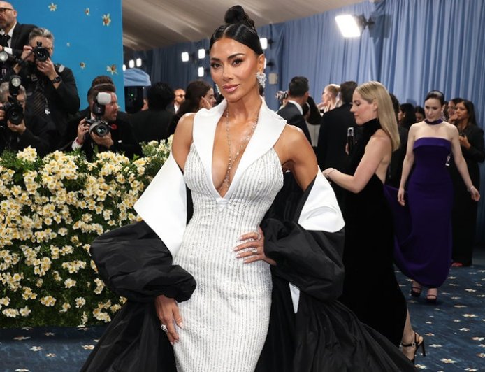 Nicole Scherzinger floods social media with bikini photos while teasing wedding plans