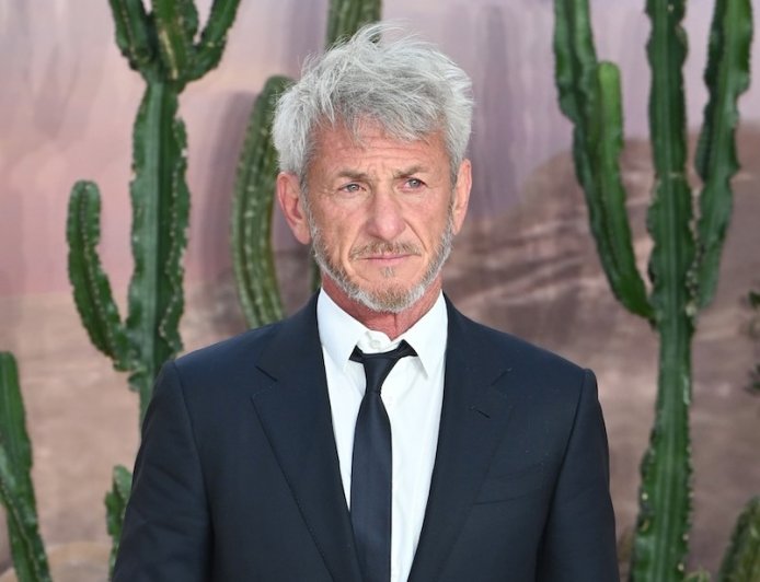 Sean Penn Smokes at Golden Globes After Nikki Glaser's 'Leather Handbag' Joke