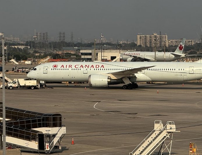 Passengers baffled and confused after screams burst from beneath taxiing Air Canada plane