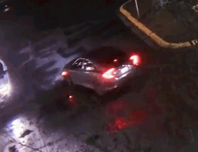 Video shows police officer ambushed in patrol car in explosion of gunfire; suspect found dead after shootout