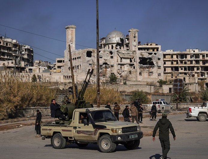 Turkey says Syria using force is an option against US-backed fighters who helped defeat ISIS