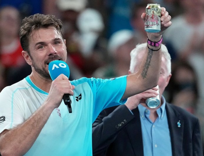 Three-time Grand Slam winner enjoys beer on court after emotional final Australian Open match