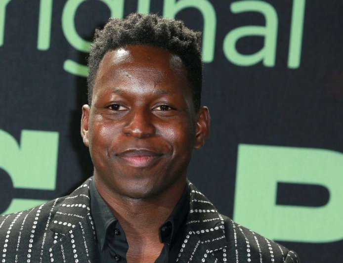 Toheeb Jimoh Breaks Down The ‘Finance Bro’ Energy That Drew Him To His ‘Industry’ Role