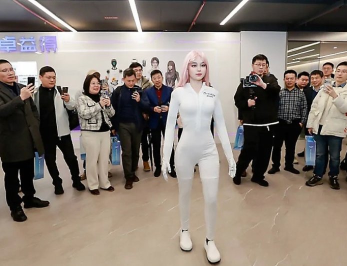 Warm-skinned AI robot with camera eyes is seriously creepy