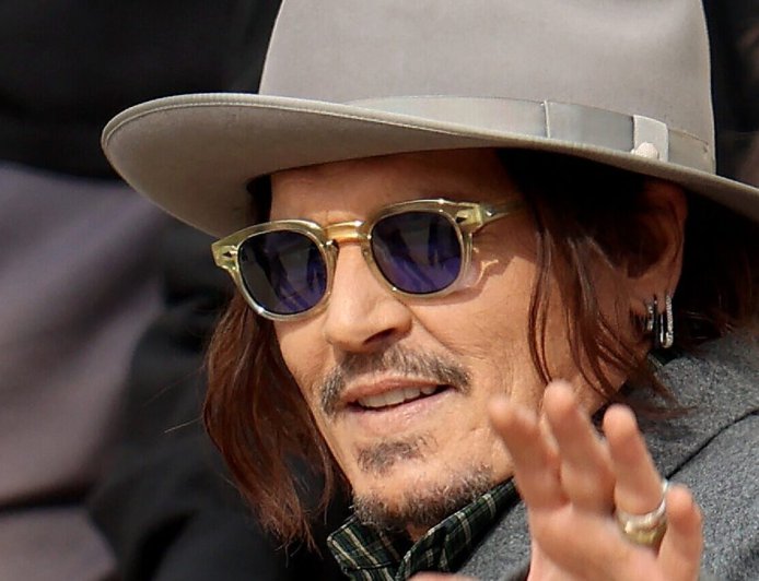 Johnny Depp Poses With Fans At Three Hearts Rum Promo Event