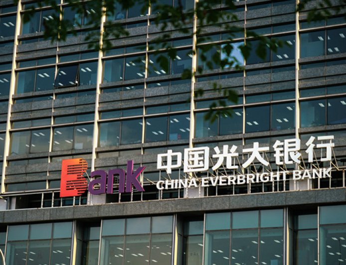 业绩承压如何破局？光大银行管理层回应营收利润波动