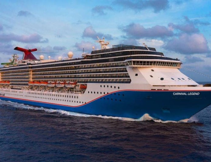 Cruise passengers witness terrifying rescue at sea as stranded man and cat pulled from failing sailboat